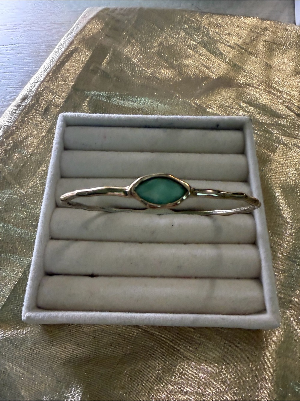 Gold-Tone Bangle Bracelet with Teal Marquise Stone